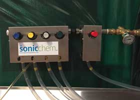 Non-electric chemical dosing system, injector and UPI Sonic Blend™ mixing chamber